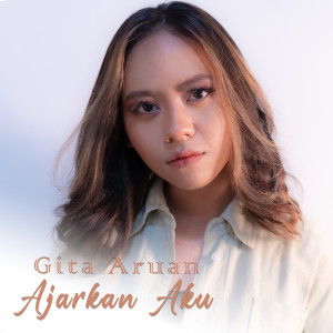 Listen to Ajarkan Aku song with lyrics from Gita Aruan