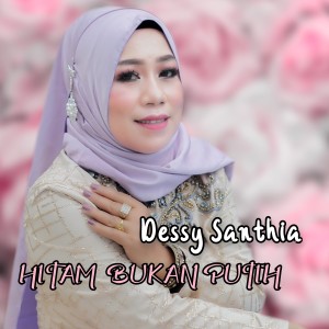 ดาวน์โหลดและฟังเพลง Hitam Bukan Putih พร้อมเนื้อเพลงจาก Dessy Santhia