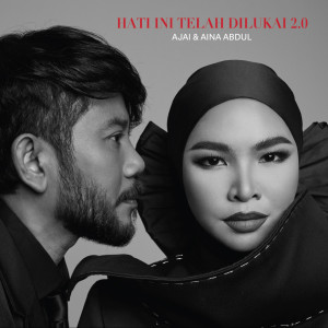 Dengarkan lagu Hati Ini Telah Dilukai 2.0 nyanyian Ajai dengan lirik