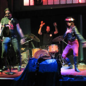 RADICAL MEDICINE: DeCoy Gallerina的專輯SACRED CHILDREN LIVE AT IVY ROOM (feat. MIGUEL GARCIA & MARK PINO) [Live]