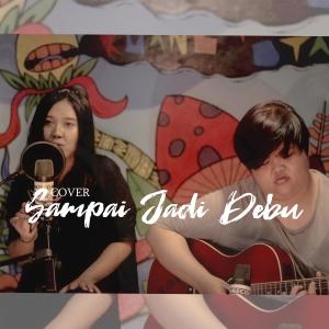 Dengarkan lagu Sampai Jadi Debu (Live Acoustic Cover) nyanyian Marcelina Milenia dengan lirik