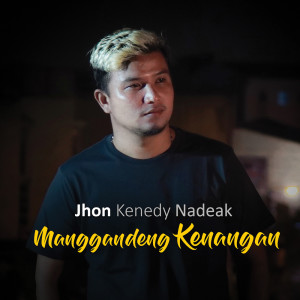 Dengarkan lagu Menggandeng Kenangan nyanyian Jhon Kenedy Nadeak dengan lirik