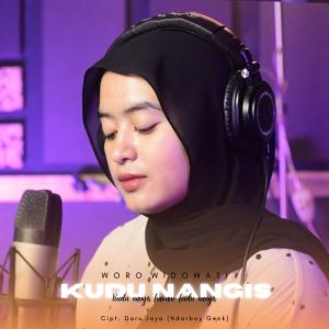 Dengarkan Kudu Nangis lagu dari Woro Widowati dengan lirik