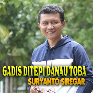 Dengarkan Gadis Ditepi Danau Toba lagu dari Suryanto Siregar dengan lirik