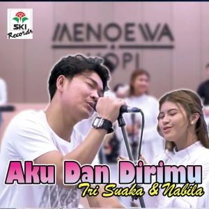 Dengarkan Aku Dan Dirmu Feat. Nabila Maharani lagu dari Tri Suaka dengan lirik