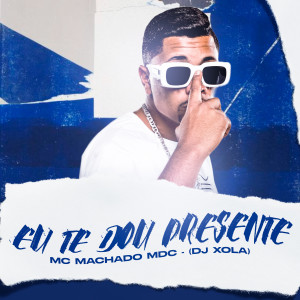 ดาวน์โหลดและฟังเพลง Eu Te Dou Presente พร้อมเนื้อเพลงจาก Mc Machado Mdc