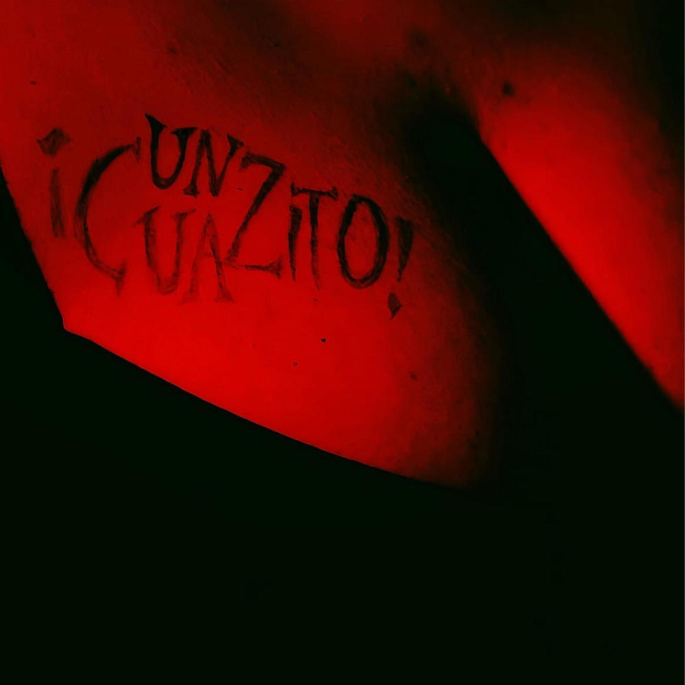 UN CUAZITO (feat. Angel G)