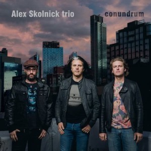 ดาวน์โหลดและฟังเพลง A Question of Moral Ambiguity พร้อมเนื้อเพลงจาก Alex Skolnick Trio