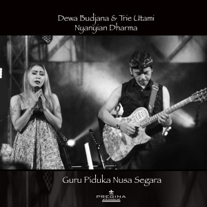 Listen to Guru Piduka Nusa Segara (feat. Dewa Budjana & Trie Utami) song with lyrics from Nyanyian Dharma