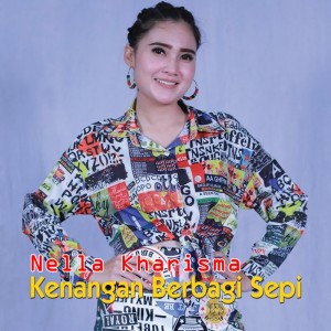 收听Nella Kharisma的Kenangan Berbagi Sepi歌词歌曲