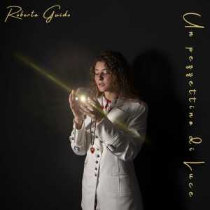 收听Roberta Guido的Un pezzettino di luce歌词歌曲