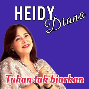 Listen to Tuhan Tak Biarkan song with lyrics from Heidy Diana