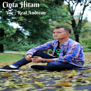 Dengarkan Cinta Hitam lagu dari Real Andrean dengan lirik
