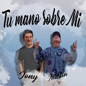 收聽Martin的Tu Mano Sobre Mi歌詞歌曲