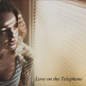 Dengarkan Love on the Telephone lagu dari Jeff Heiniger dengan lirik