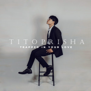 Dengarkan lagu Trapped In Your Love nyanyian Tito Prisha Jr dengan lirik