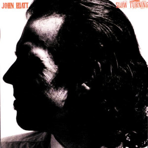 ดาวน์โหลดและฟังเพลง Slow Turning พร้อมเนื้อเพลงจาก John Hiatt