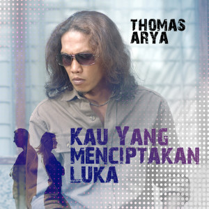 Dengarkan Kau Yang Menciptakan Luka lagu dari Thomas Arya dengan lirik