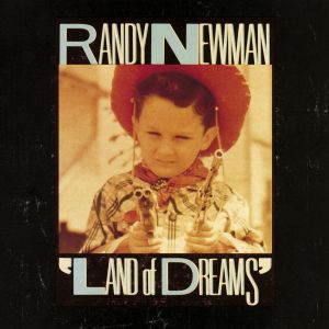 收聽Randy Newman的Roll with the Punches歌詞歌曲