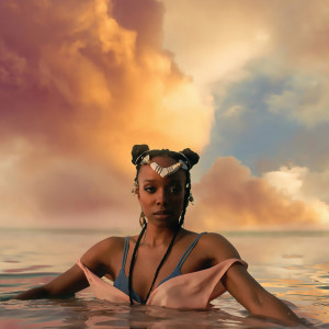ดาวน์โหลดและฟังเพลง In My Name พร้อมเนื้อเพลงจาก Jamila Woods