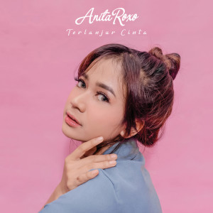 Listen to Terlanjur Cinta song with lyrics from Anita Roxo