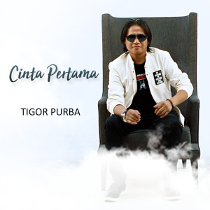 Listen to Cinta Pertama song with lyrics from Tigor Purba