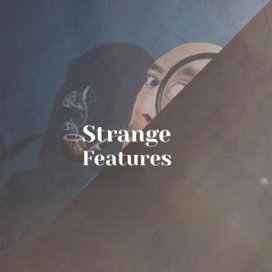 Album Strange Features oleh Various