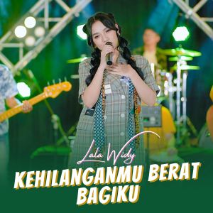 Listen to Kehilanganmu Berat Bagiku song with lyrics from Lala Widy