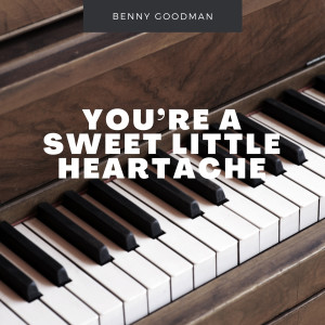 收聽Benny Goodman的What Have You Got That Gets Me?歌詞歌曲