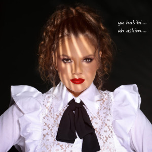 Listen to Ya habibi... ah askim... song with lyrics from Nely