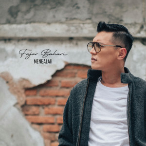 Dengarkan Mengalah lagu dari Fajar Bahari dengan lirik
