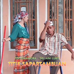 Dengarkan Titik Sapartambuan lagu dari Top Simamora dengan lirik