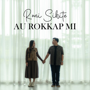 Listen to AU ROKKAP MI song with lyrics from Roni Sihite