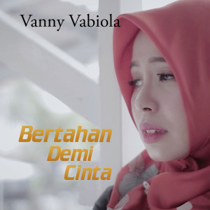 Dengarkan Bertahan Demi Cinta lagu dari Vanny Vabiola dengan lirik