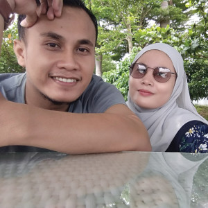 Listen to Surga Dalam Peluknya song with lyrics from Ali Sugeng