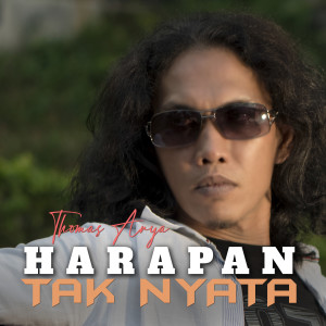 Dengarkan Harapan Tak Nyata (Ayu) lagu dari Thomas Arya dengan lirik
