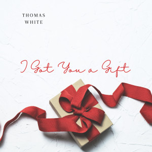 Dengarkan lagu I Got You a Gift nyanyian Thomas White dengan lirik
