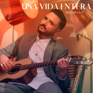 Listen to Una Vida Entera song with lyrics from Riki RIvera