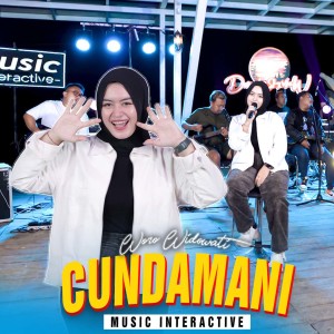 Dengarkan Cundamani lagu dari Woro Widowati dengan lirik