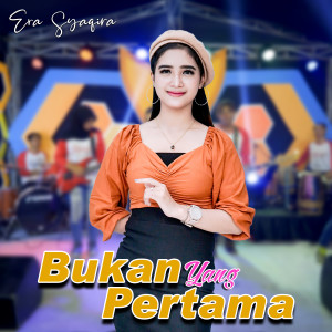 Dengarkan Bukan Yang Pertama lagu dari Era Syaqira dengan lirik
