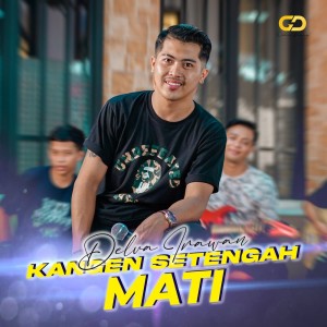 Listen to Kangen Setengah Mati song with lyrics from Delva Irawan