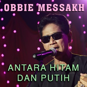 ดาวน์โหลดและฟังเพลง Antara Hitam Dan Putih พร้อมเนื้อเพลงจาก Obbie Mesakh