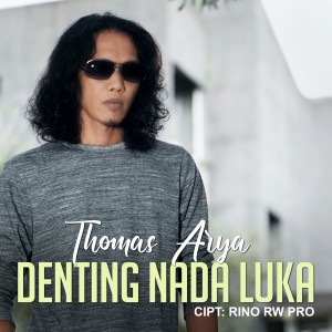 Album Thomas Arya - Denting Nada Luka oleh Thomas Arya