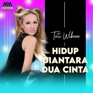 ดาวน์โหลดและฟังเพลง Hidup Diantara Dua Cinta พร้อมเนื้อเพลงจาก Tuty Wibowo