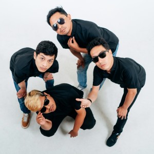 Listen to Larut Dalam Rindu song with lyrics from Enemy Down