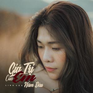 Dengarkan lagu Giá Trị Của Em Nằm Đâu nyanyian Linh Cáo dengan lirik