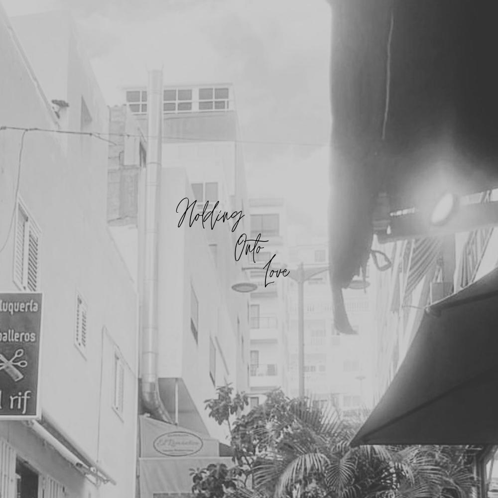 Holding Onto Love (feat. Micwise)