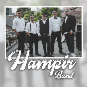 Dengarkan Mungkin Mudik Tahun Depan lagu dari Hampir Band dengan lirik