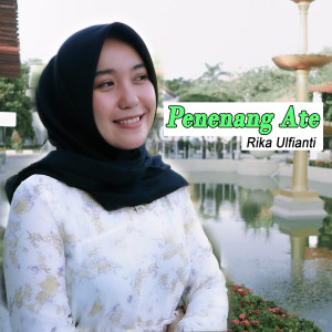 ดาวน์โหลดและฟังเพลง Penenang Ate พร้อมเนื้อเพลงจาก Rika Ulfiyanti