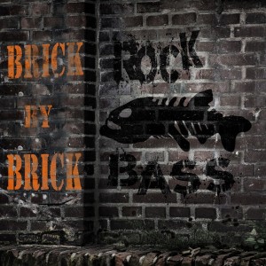Dengarkan lagu Brick by Brick nyanyian Rock Bass dengan lirik